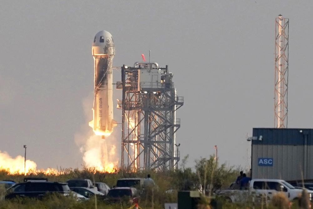 Jeff Bezos blasts into space on own rocket